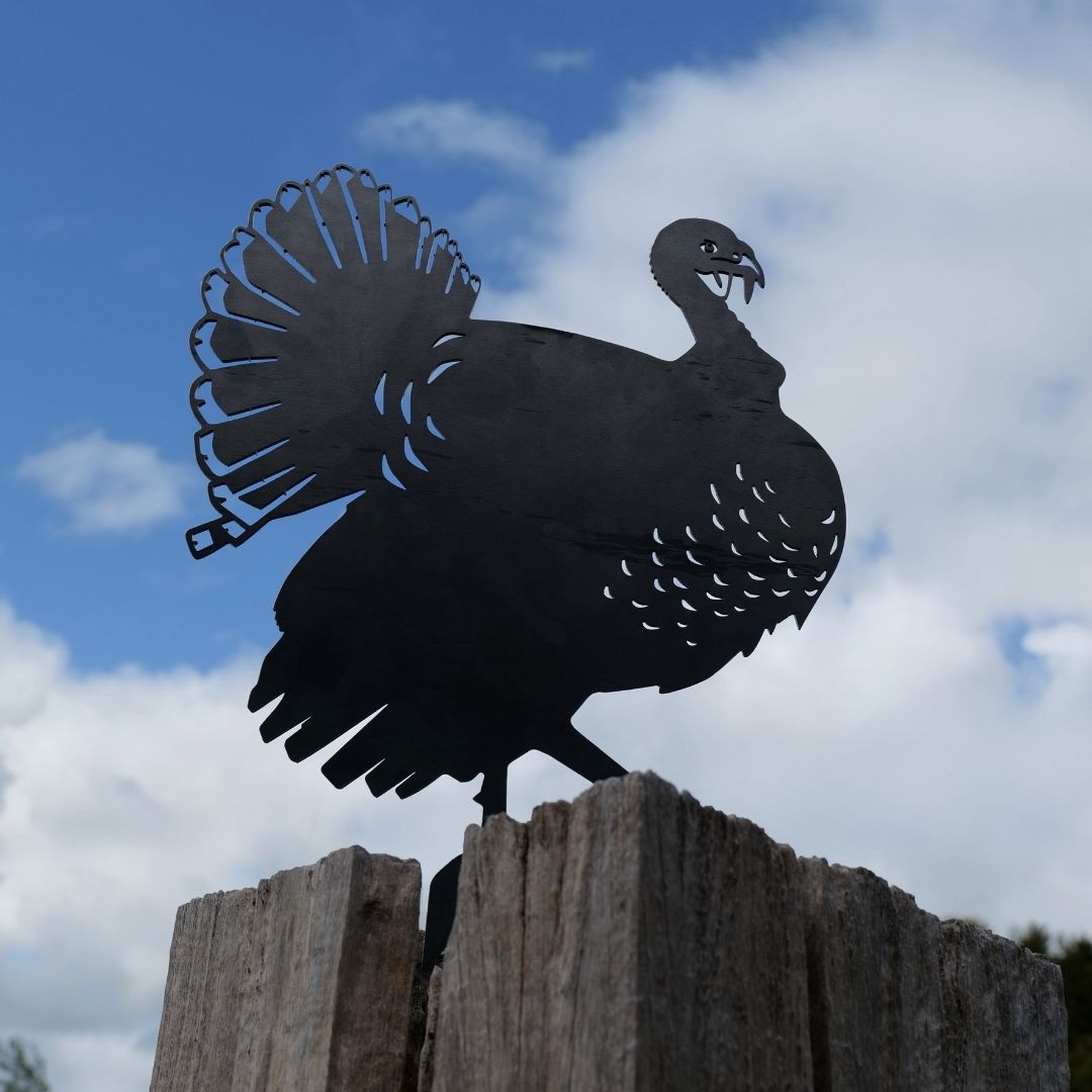 The Metalbird Canada Turkey is a striking metal garden silhouette, perched on a wooden post—a perfect gift for nature lovers.