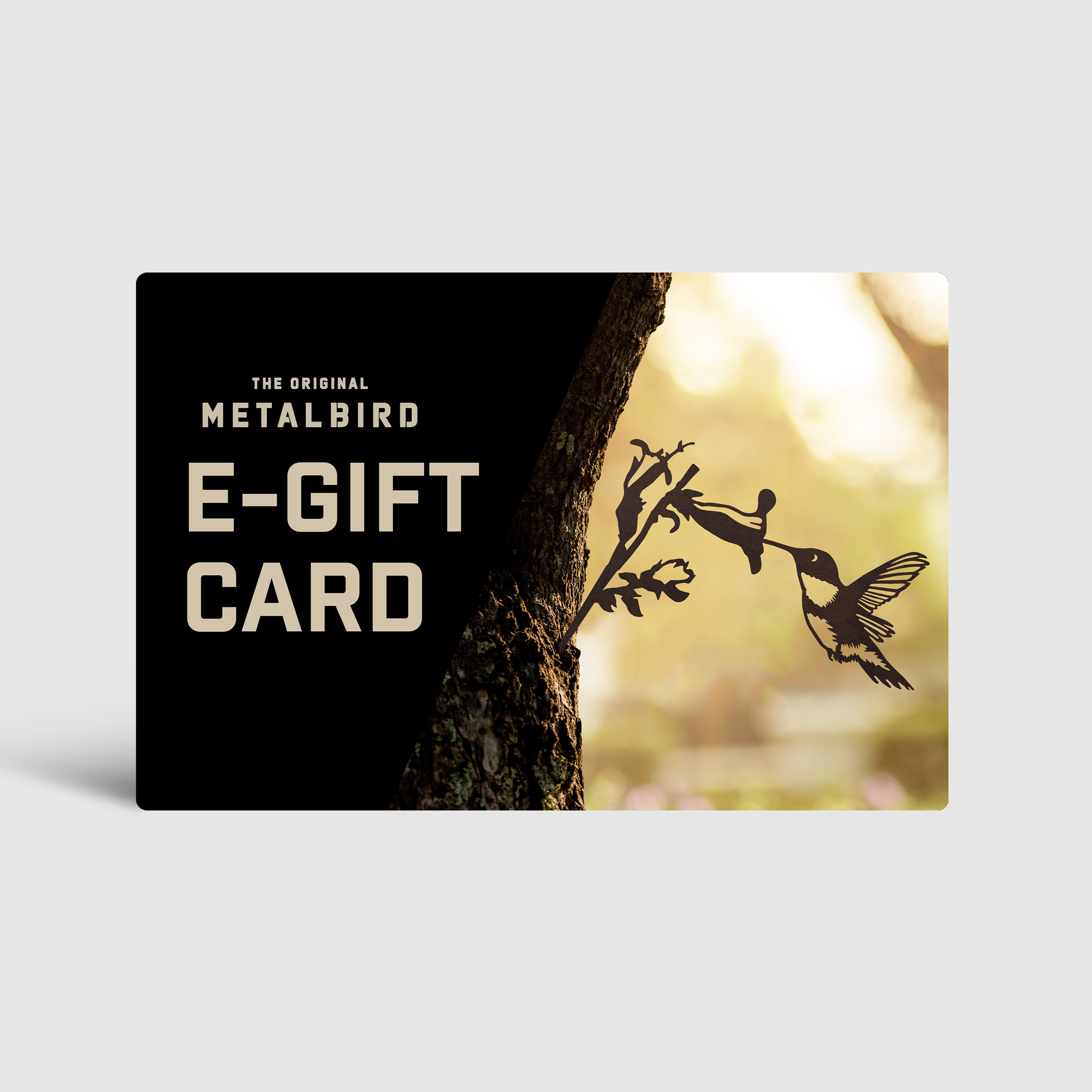 A Metalbird Canada Gift Voucher shows bold text on the left and a corten steel bird silhouette attached to a tree in sunlit, blurred outdoors on the right.