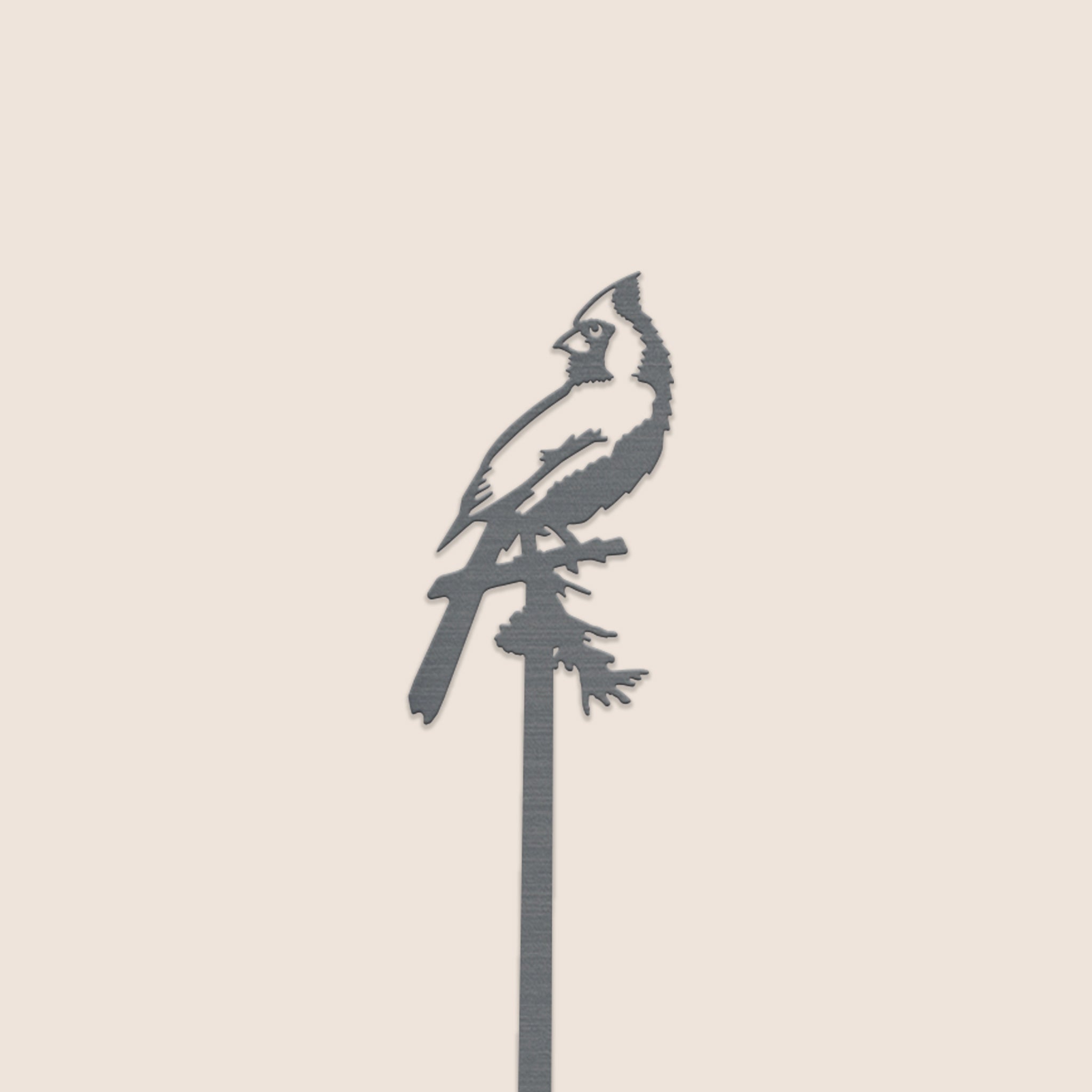 The Metalbird Canada Cardinal Plant Stake - 40" features a metal cardinal perched on a branch, creating striking yard art that stands out beautifully against any plain background.