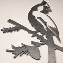 The Cardinal Mom & Mini Set by Metalbird Canada features metal cardinal silhouettes perched on pine branches—a stylish addition to any decor and a thoughtful gift for bird lovers. Displayed against a plain light background.