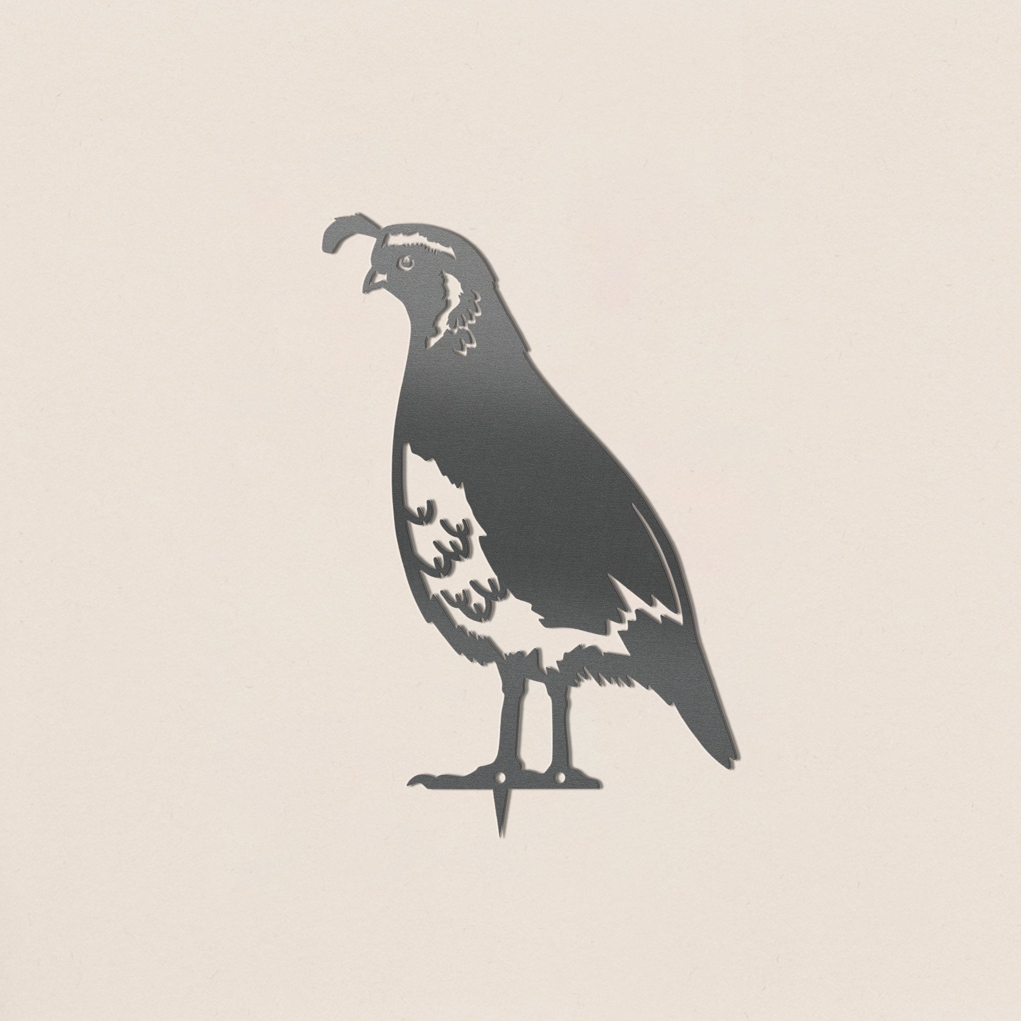 The Quail by Metalbird Canada features a bold black and white silhouette of the bird with its iconic head plume, creating striking garden art on a light beige background.
