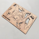 Wooden Hanging Decorations by Metalbird Canada with metal-inspired bird, owl, and butterfly silhouettes, displayed on a light gray background.