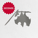 The Metalbird Seconds by Metalbird Canada - Seconds features a metal bat silhouette hanging upside down from a branch against a white wall, with a red starburst labeled "SECONDS" in bold white letters—an eye-catching gift idea.