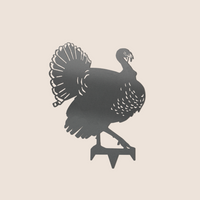 The Metalbird Canada Turkey features a striking silhouette with fanned tail feathers and detailed cut-out patterns—ideal as unique yard or garden art.