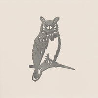 The Great Horned Owl by Metalbird Canada features a minimalist stencil design of an owl perched on a branch with simple black lines on a light beige background—ideal inspiration for metal yard art.