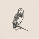 Barn Owl by Metalbird Canada: a black-and-white ink drawing featuring a detailed owl perched on a thin branch against a light background. Its striking feathers and facial disc inspire unique corten steel yard art or make a thoughtful gift.