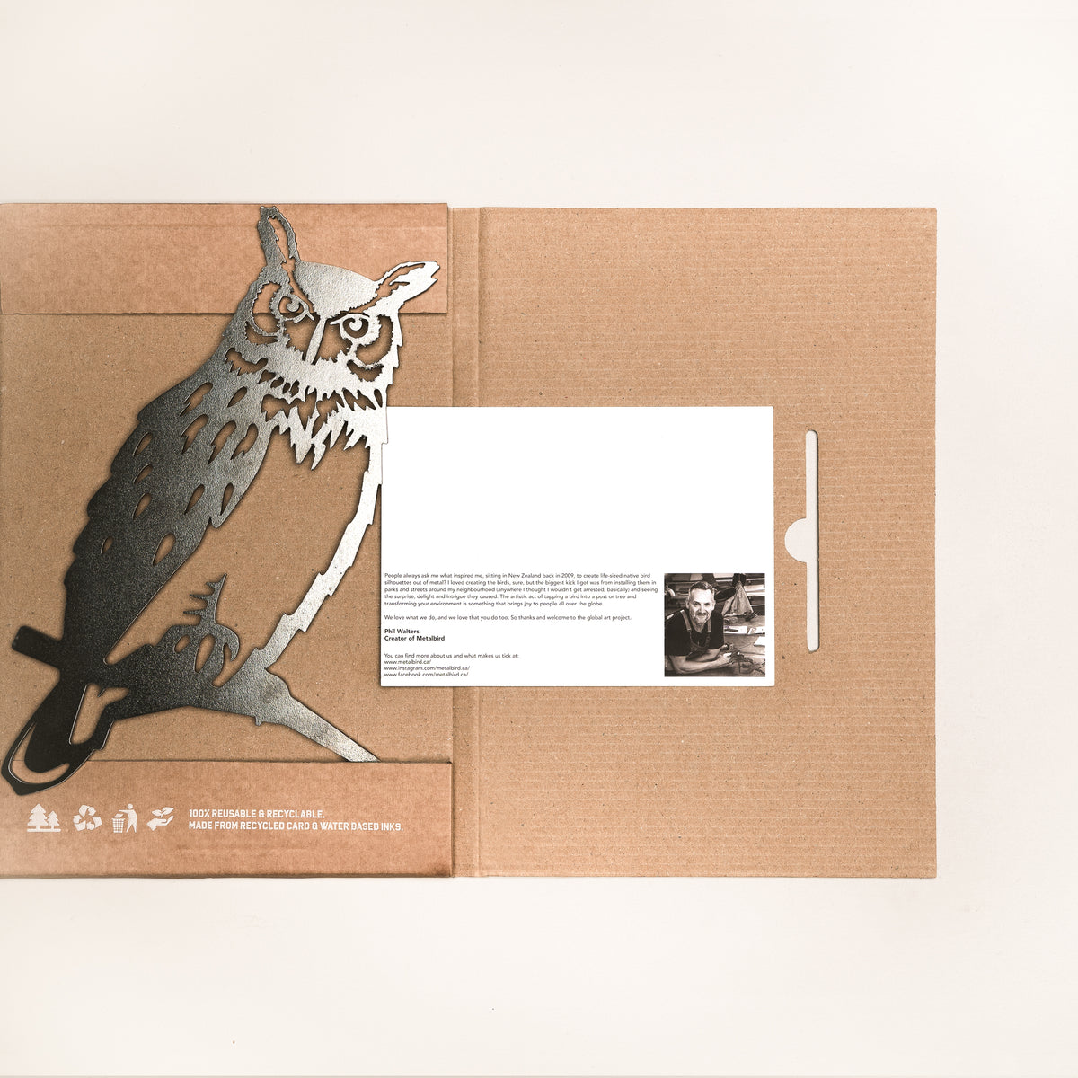 Great Horned Owl steel silhouette in open flat cardboard gift packaging with an information card.